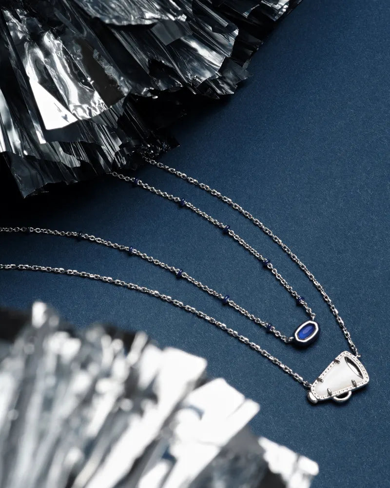 https://cdn.shopify.com/s/files/1/0745/5948/8224/files/kendra-scott-cheer-short-pendant-necklace-rhodium-white-mop-00.webp?v=1741461499
