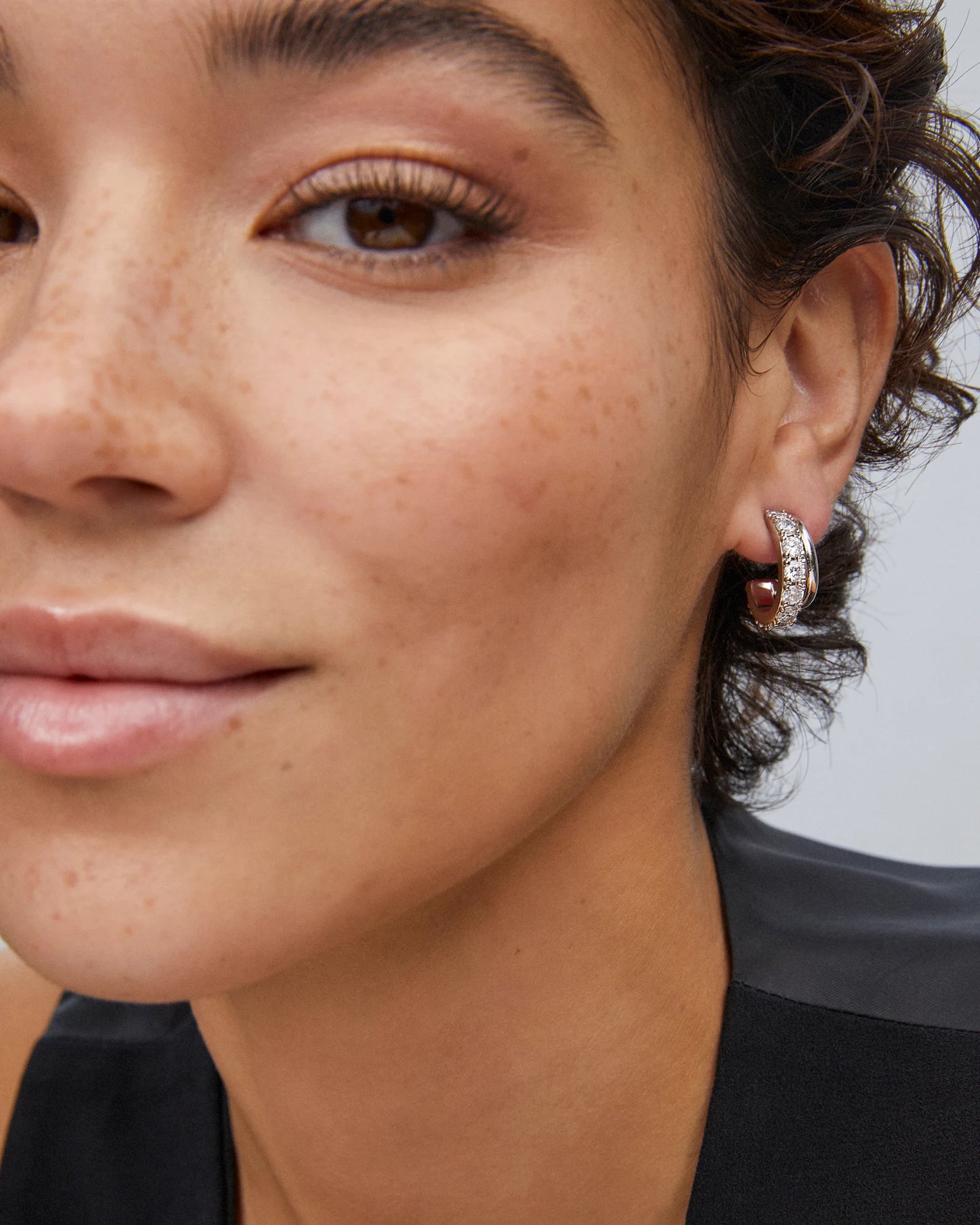 LIVY HUGGIE EARRINGS in RHODIUM METAL