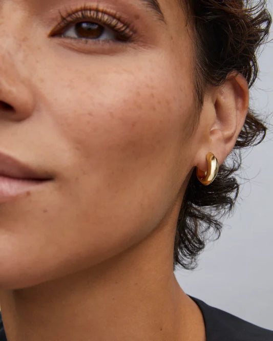 MIKKI METAL HUGGIE EARRINGS in POLISHED GOLD